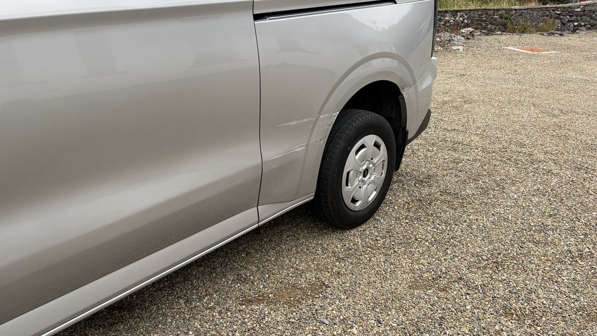 Wider view of the passenger side of the van